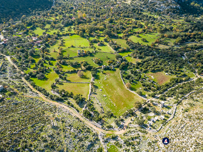 Dodurga plateau showing crops interspersed with ancient ruins