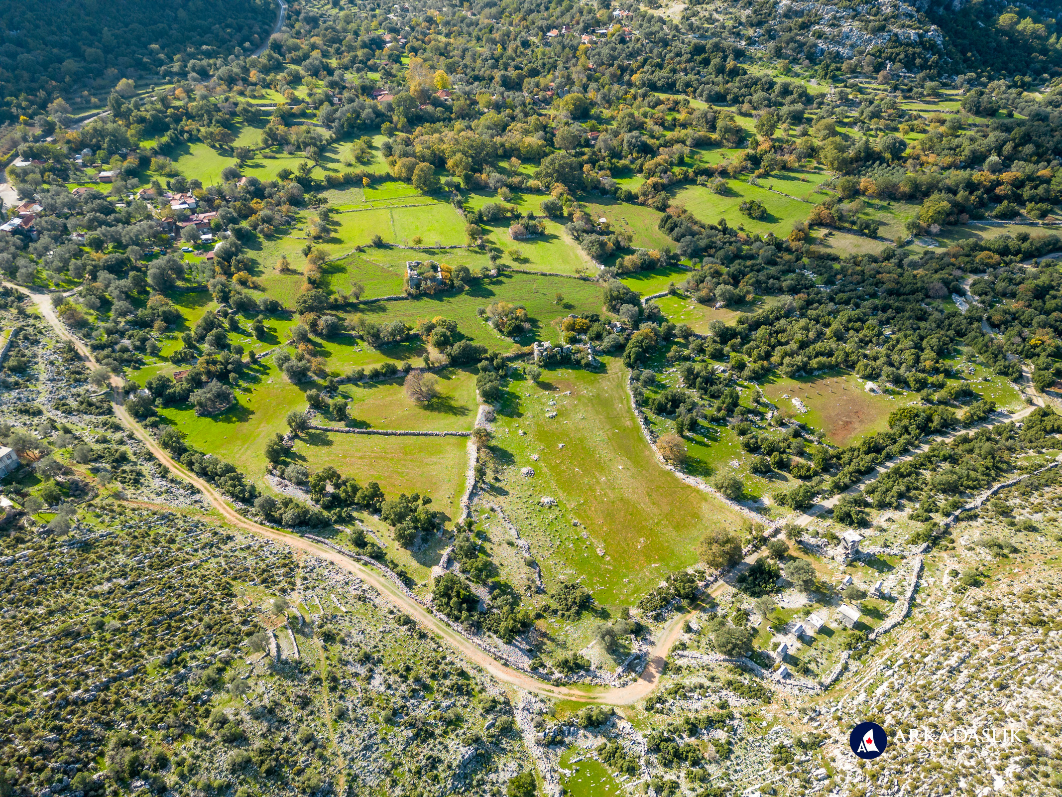 Dodurga plateau showing crops interspersed with ancient ruins