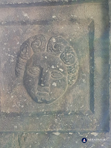 Another carved face on the cassette-ceiling tomb at Sidyma