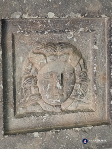 Carved face from the coffered ceiling of the Sidyma tomb