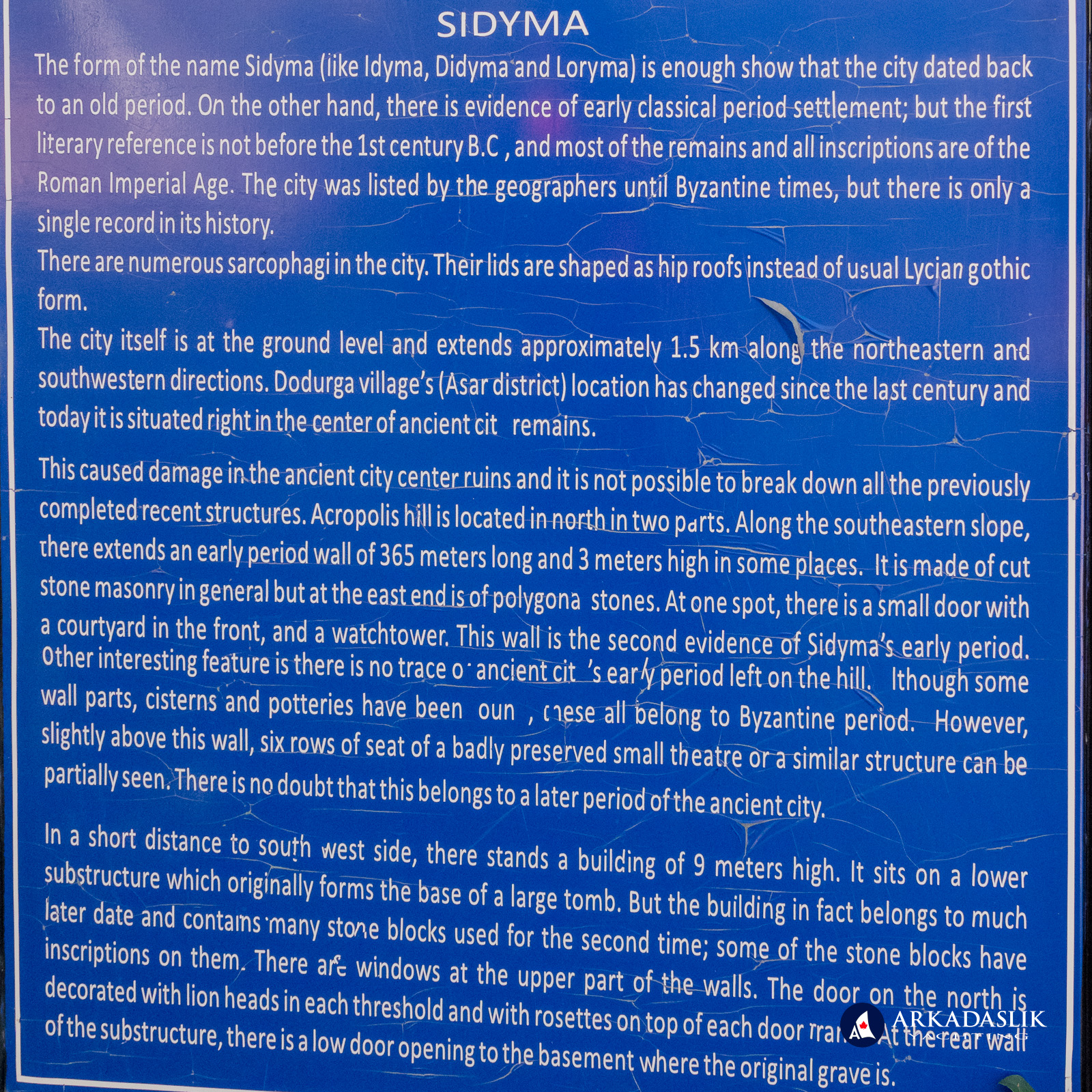 Sidyma informational sign at the village entrance