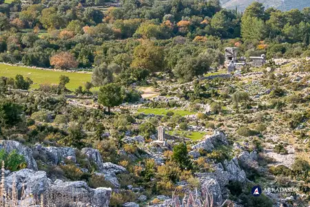 Cluster of tombs in the background and the ruins of an ancient watchtower in the foreground
